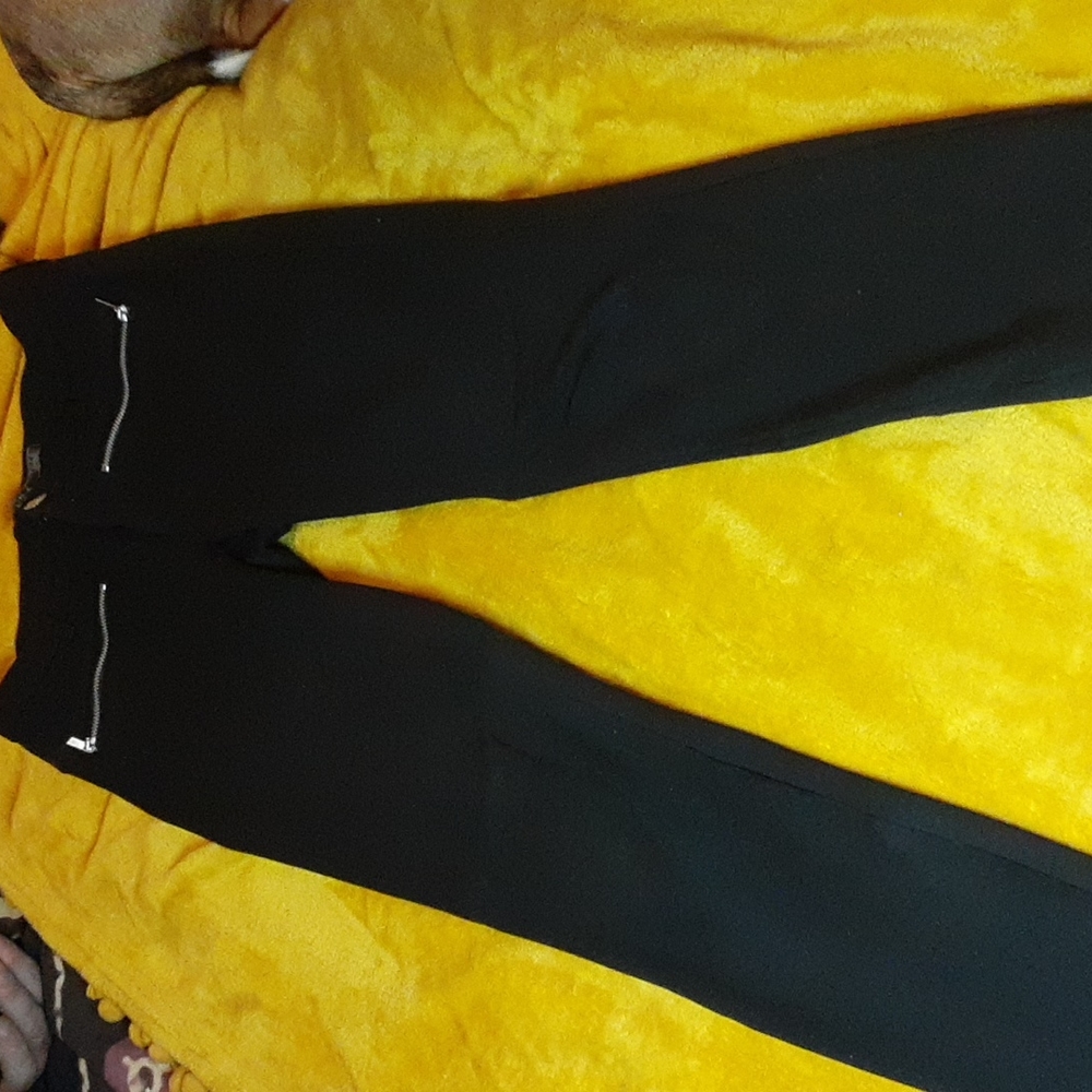 Black zipper detail stretchy pants.